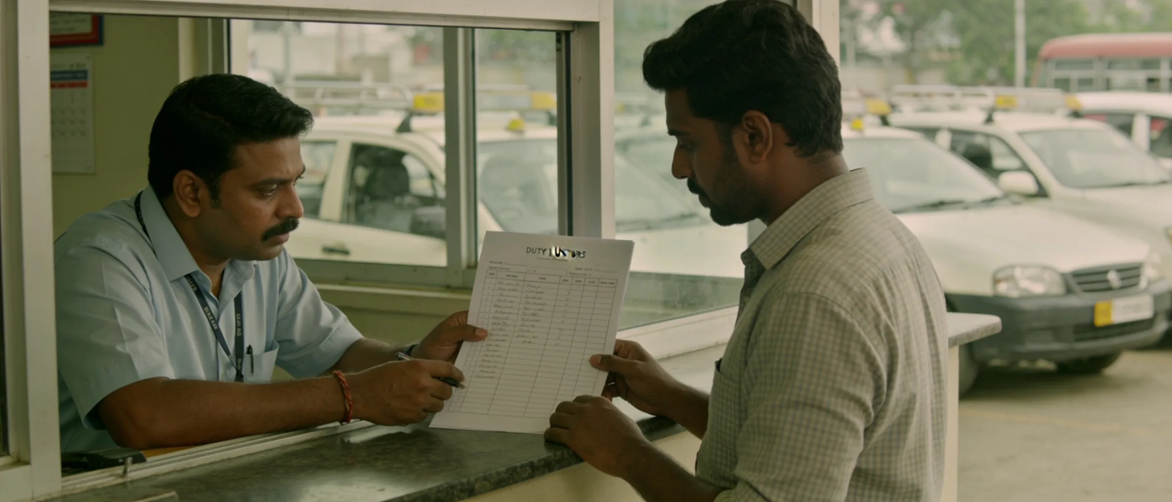 Driver duty roster and vehicle checklist reviewed at the coordination desk